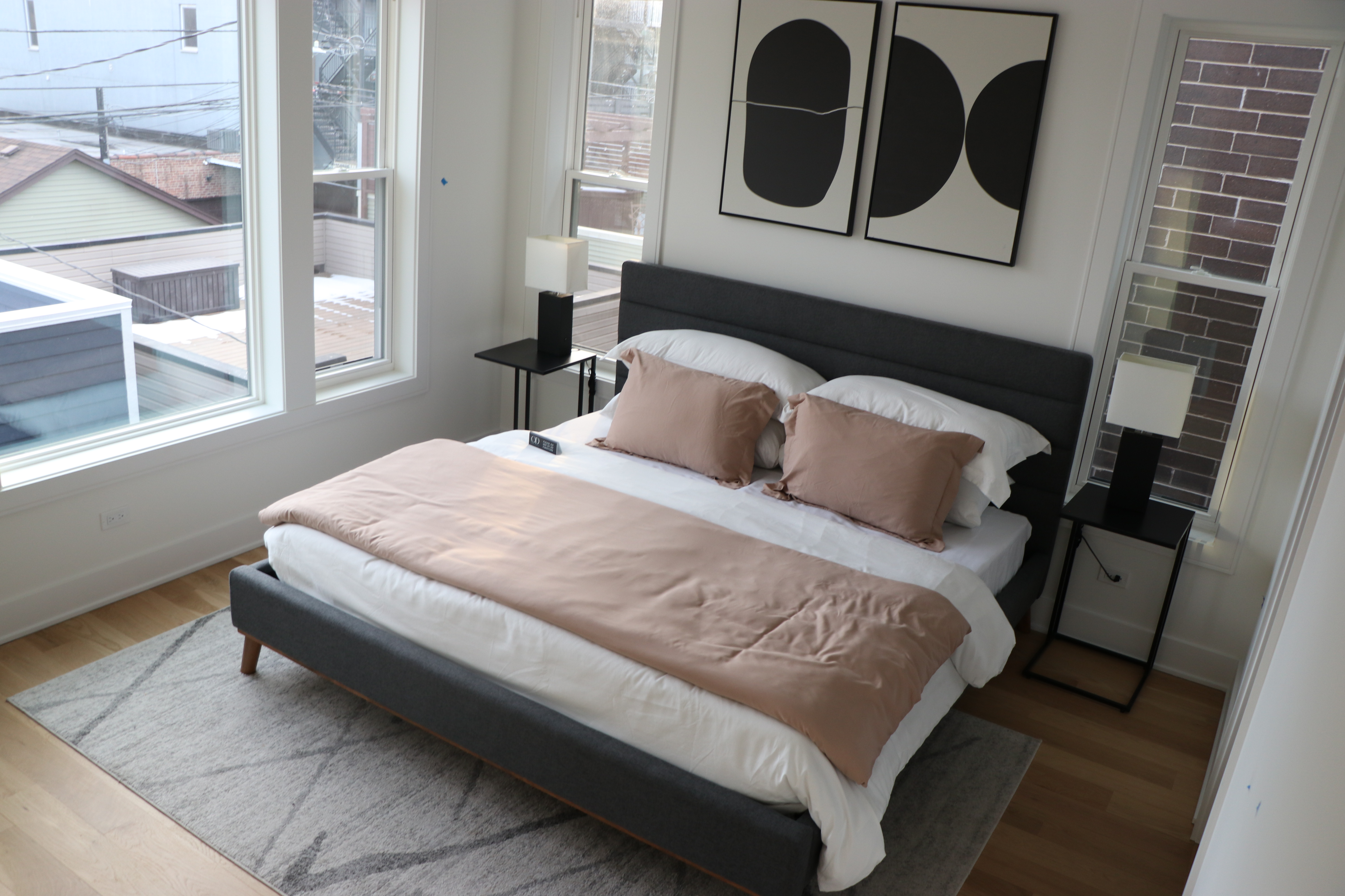 Whole-home interior at 2433 W Cuyler — finished bedrooms, common areas, basement.